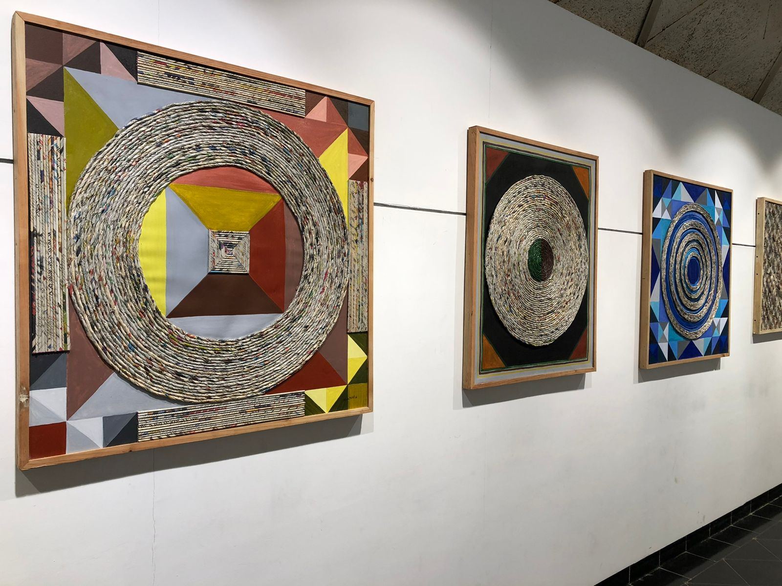 Geometric works in rolled newspaper